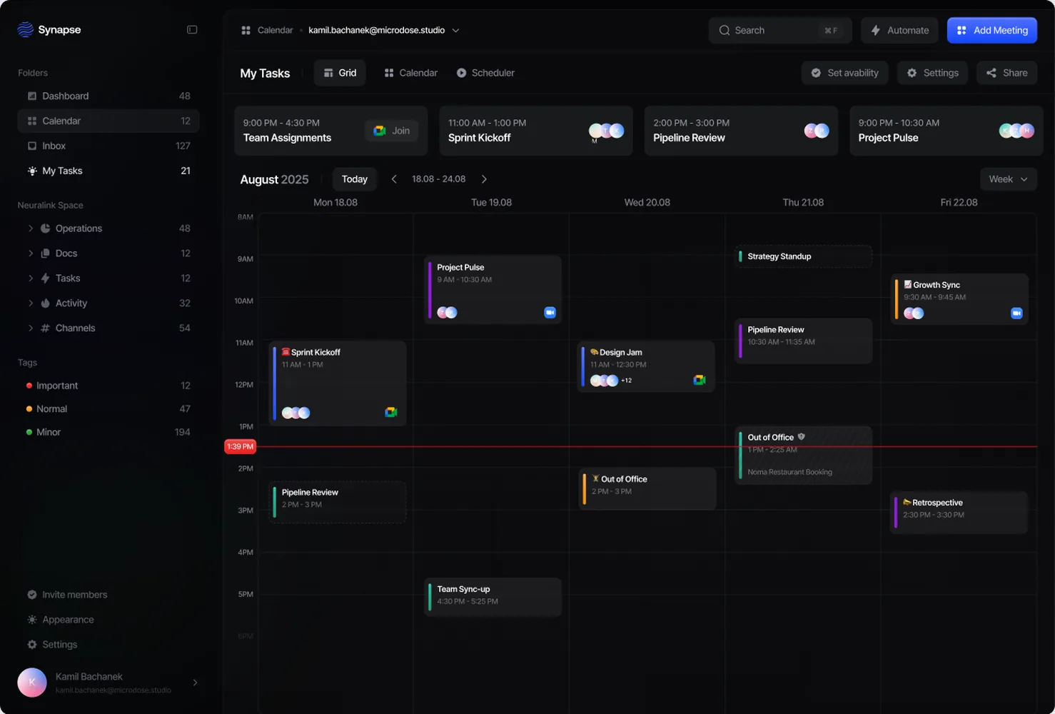 Dark team calendar with weekly meeting grid
