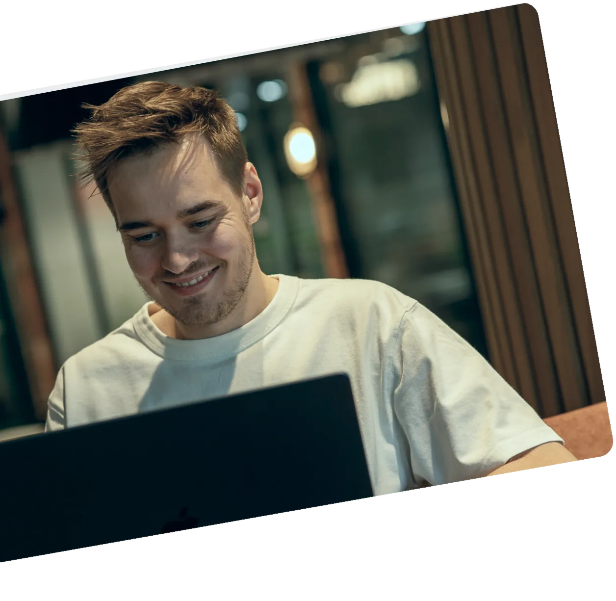 Kamil Bachanek, co-founder of Microdose Studio, working on a laptop