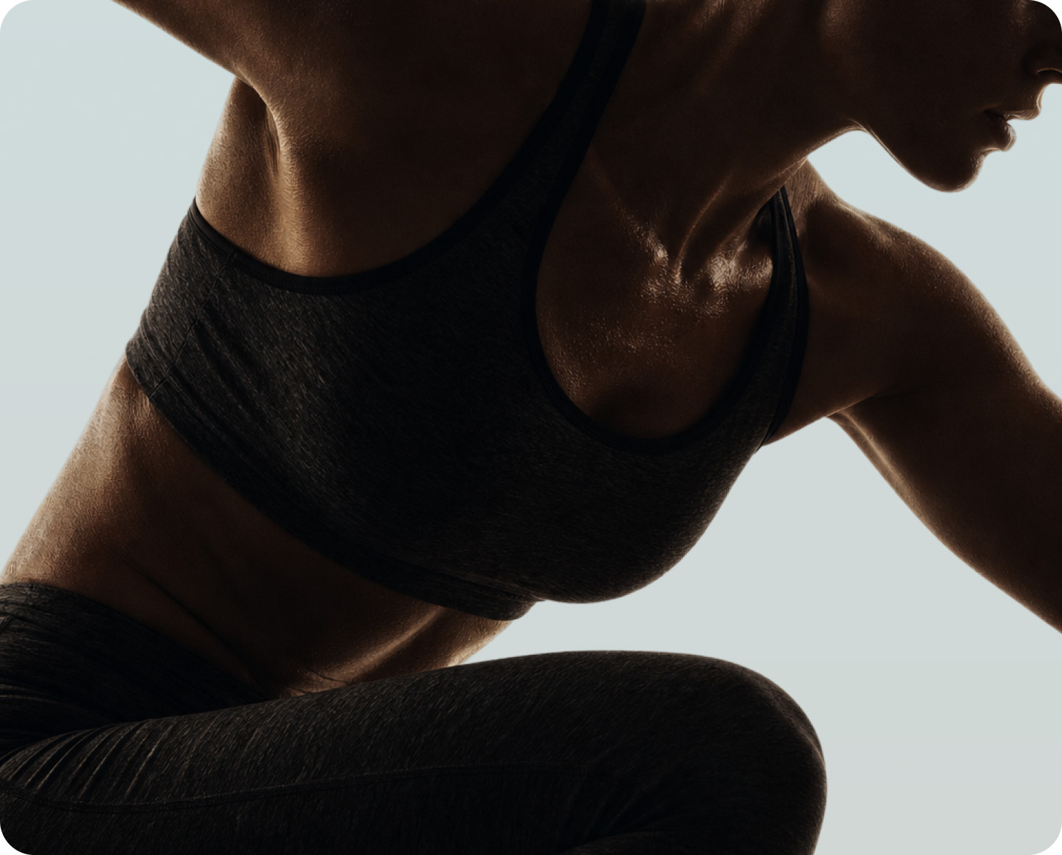 Treat brand campaign photograph of an athlete in dark sportswear